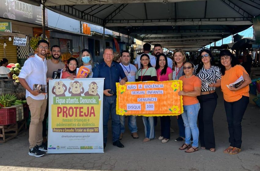 Cras Cidade Sorriso leva campanha Maio Laranja à feira do Benedito Bentes